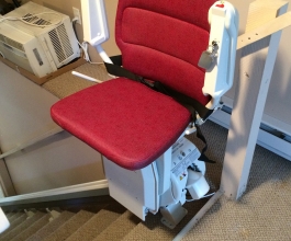 Custom, red seat on stairlift in Dayton